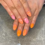 π§‘ 18 Orange Acrylic Nails That Turn Every Hand Into the Main Attraction Fashion image by @toughasnails_bykate