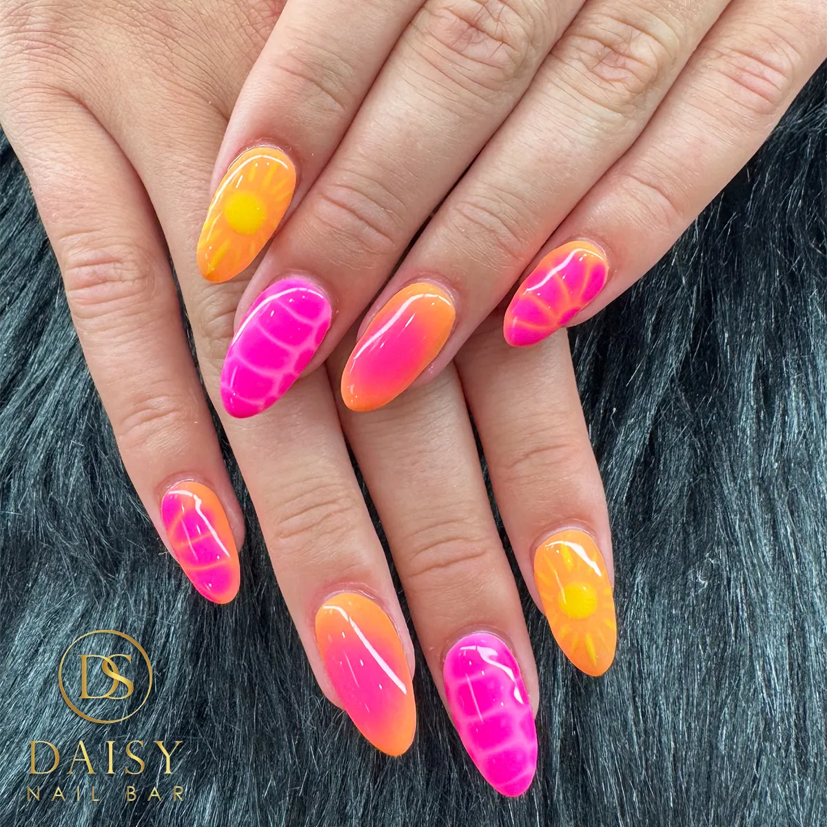 Neon pink-to-orange ombrรฉ with sun motifs