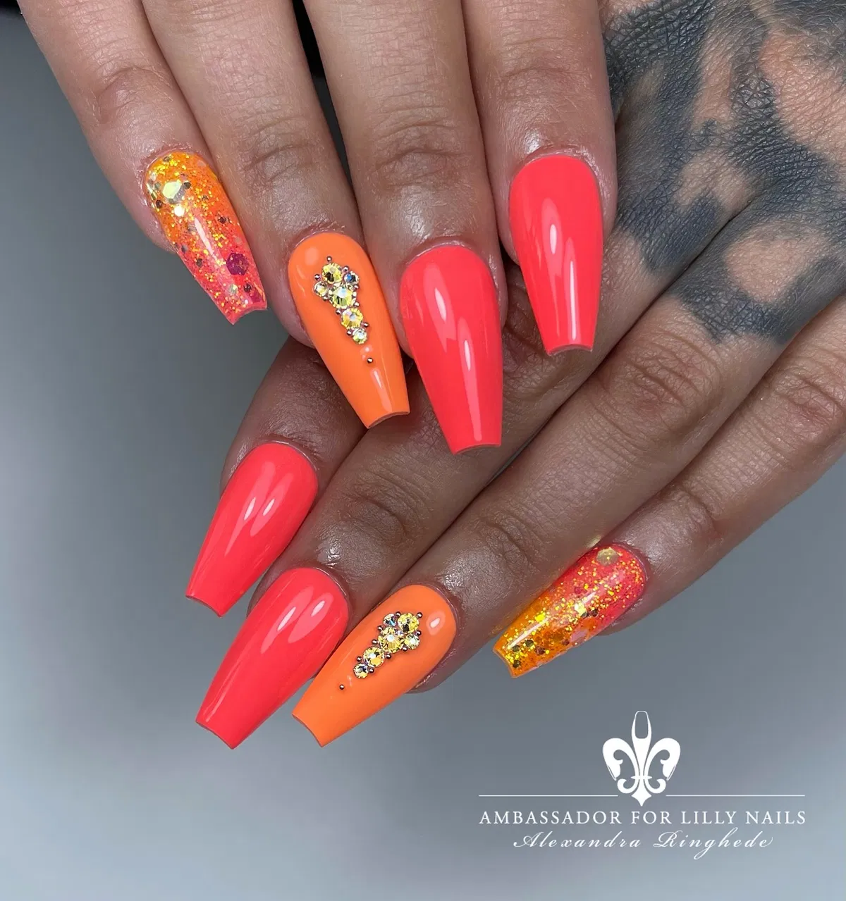 Coffin neon coral and orange with rhinestones and glitter ombrรฉ