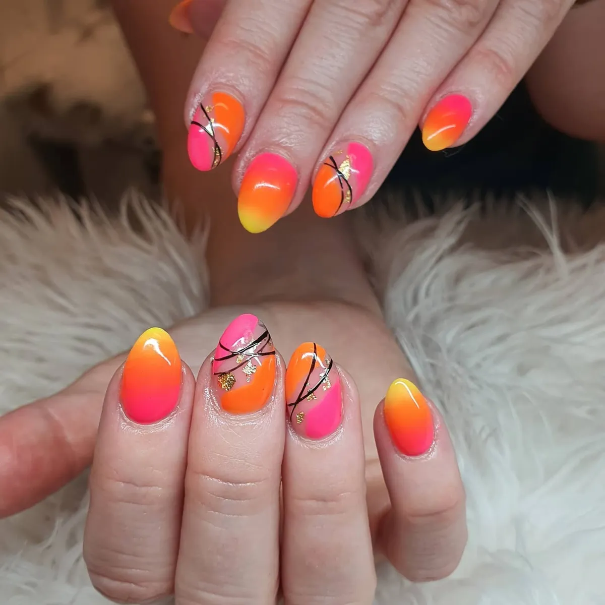 Neon ombrรฉ with black line accents and gold foil details