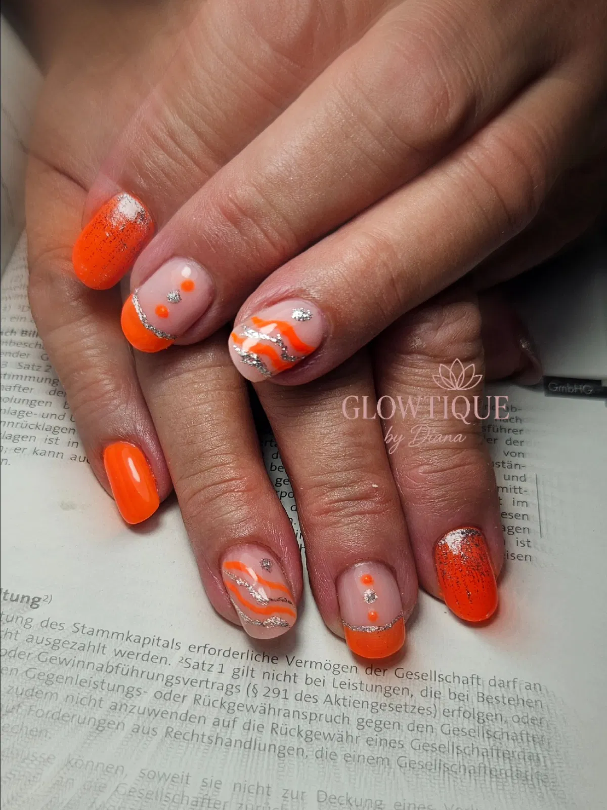 Short neon orange with glitter waves and dotted nude accents