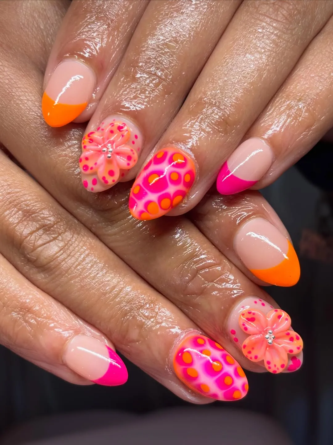 Neon French tips with dotted accents and 3D flowers