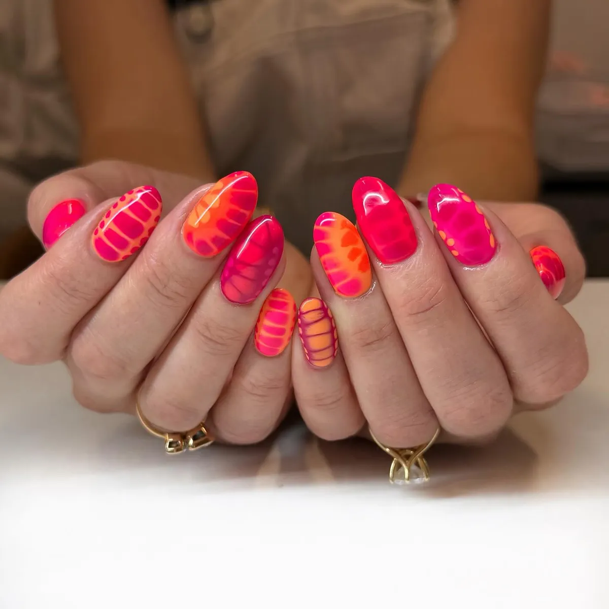 Neon abstract citrus-section patterns in pink and orange