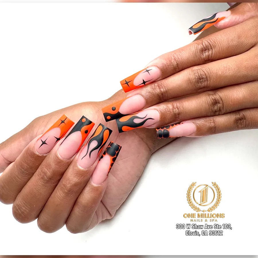 Nude base with orange-and-black flame-like graphics