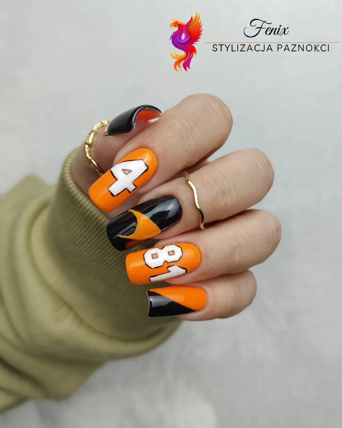 Orange-and-black color block with white numbers