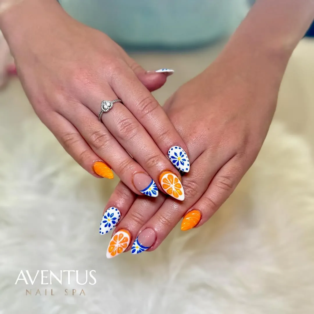 Orange citrus accents paired with blue-and-white patterns