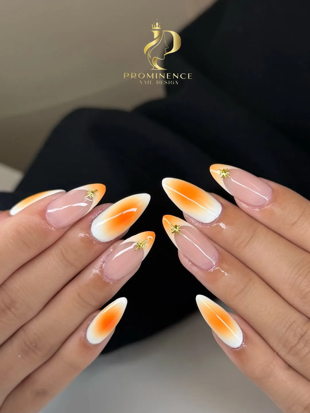 White-to-orange gradient tips with star charms