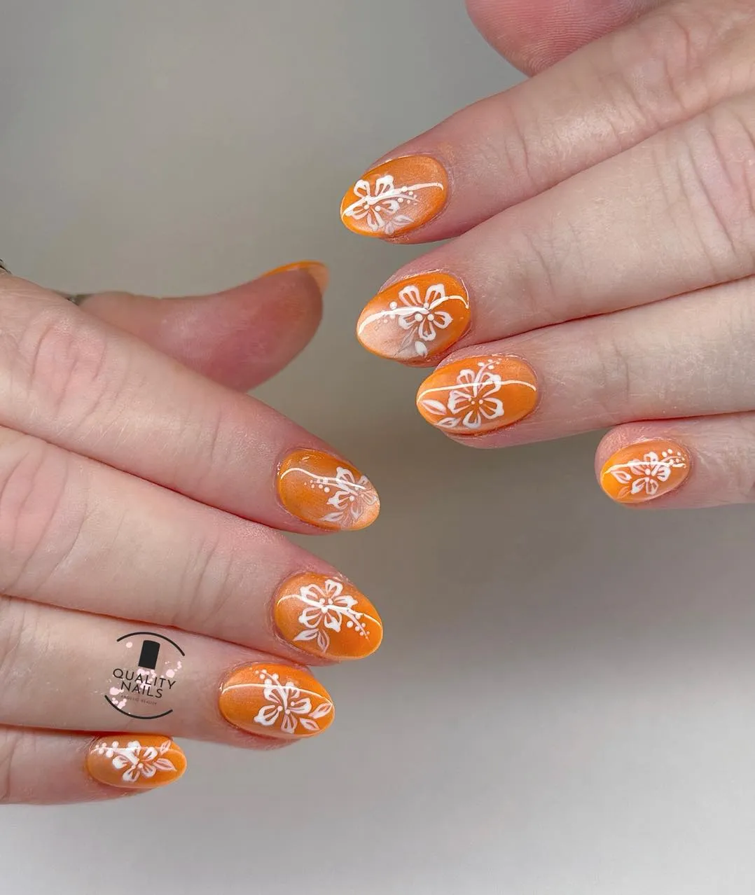 Orange base with white floral line art