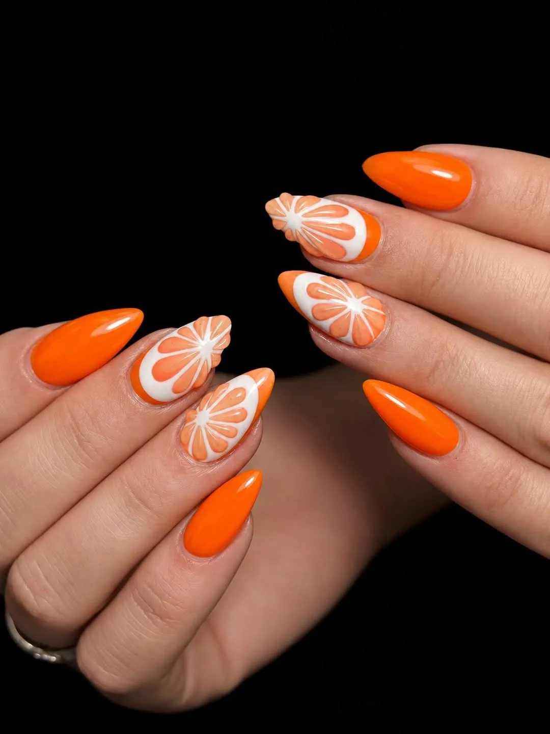 Bright orange almond set with orange-slice accents