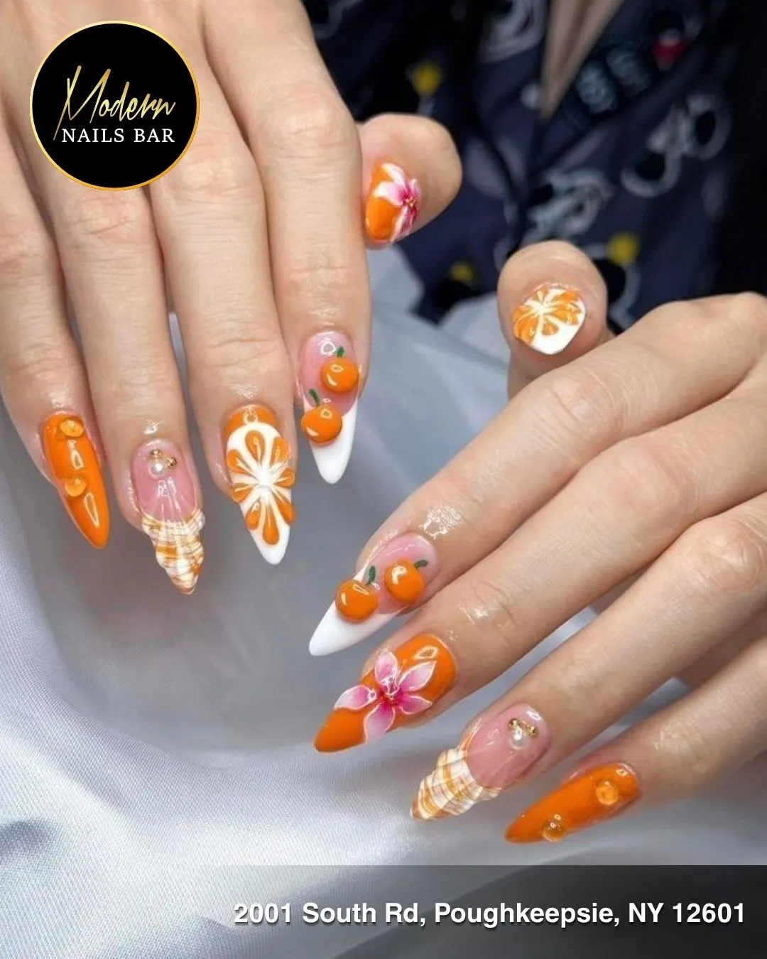 3D fruit accents with orange-and-white mixed art