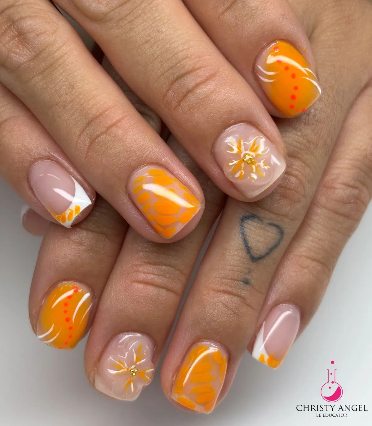 Short Square Orange-and-White French Variations with Floral Details