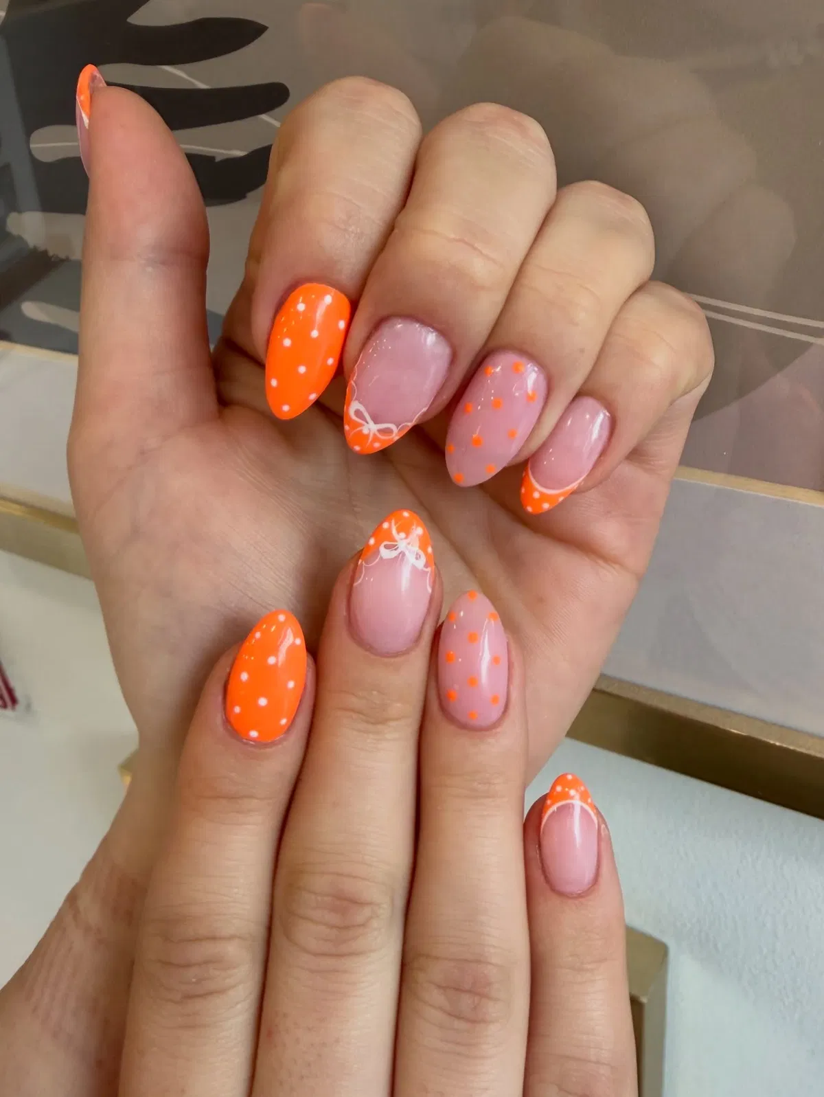 Orange French Tips with White Bows and Polka Dots