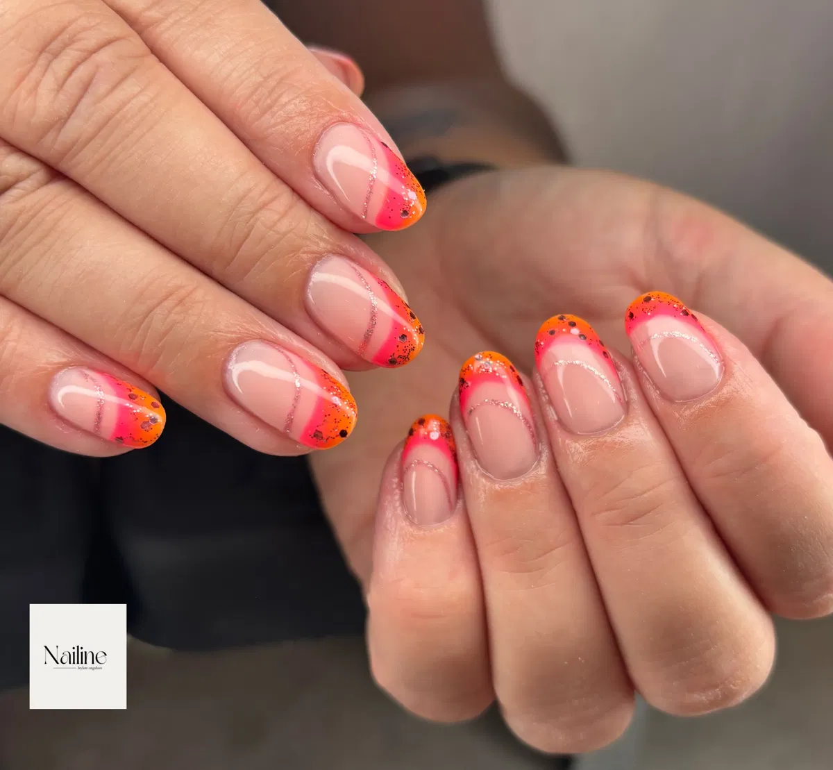 Pink-to-Orange Speckled French Tips with Silver Curves