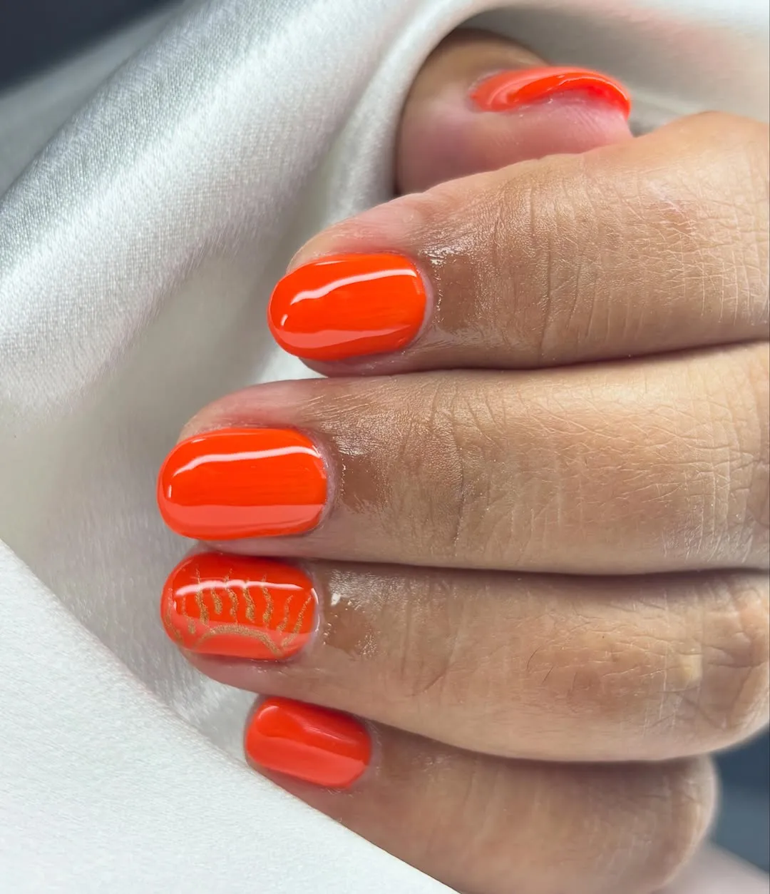 Solid bright orange with a gold line accent