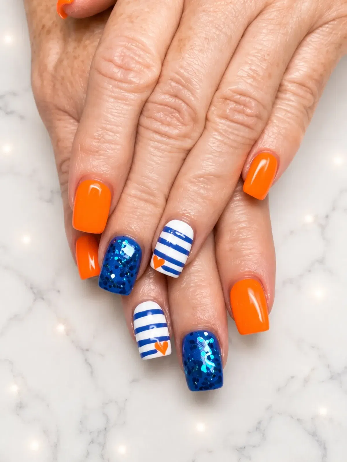 Bright Orange with Blue Glitter and Striped Heart Accents