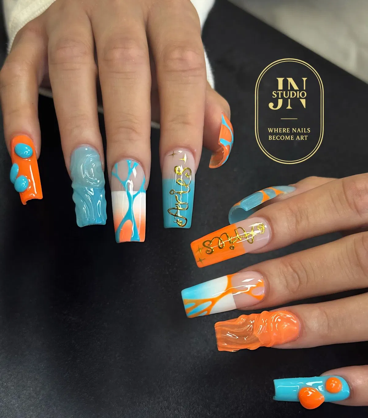 Orange and Turquoise 3D Nails with Gold Script Lettering