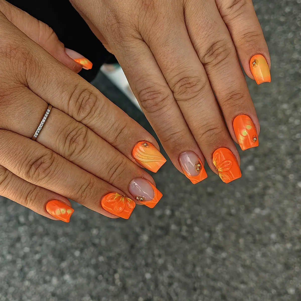 Glossy Orange Set with Nude French Tips and Gold Stud Accents