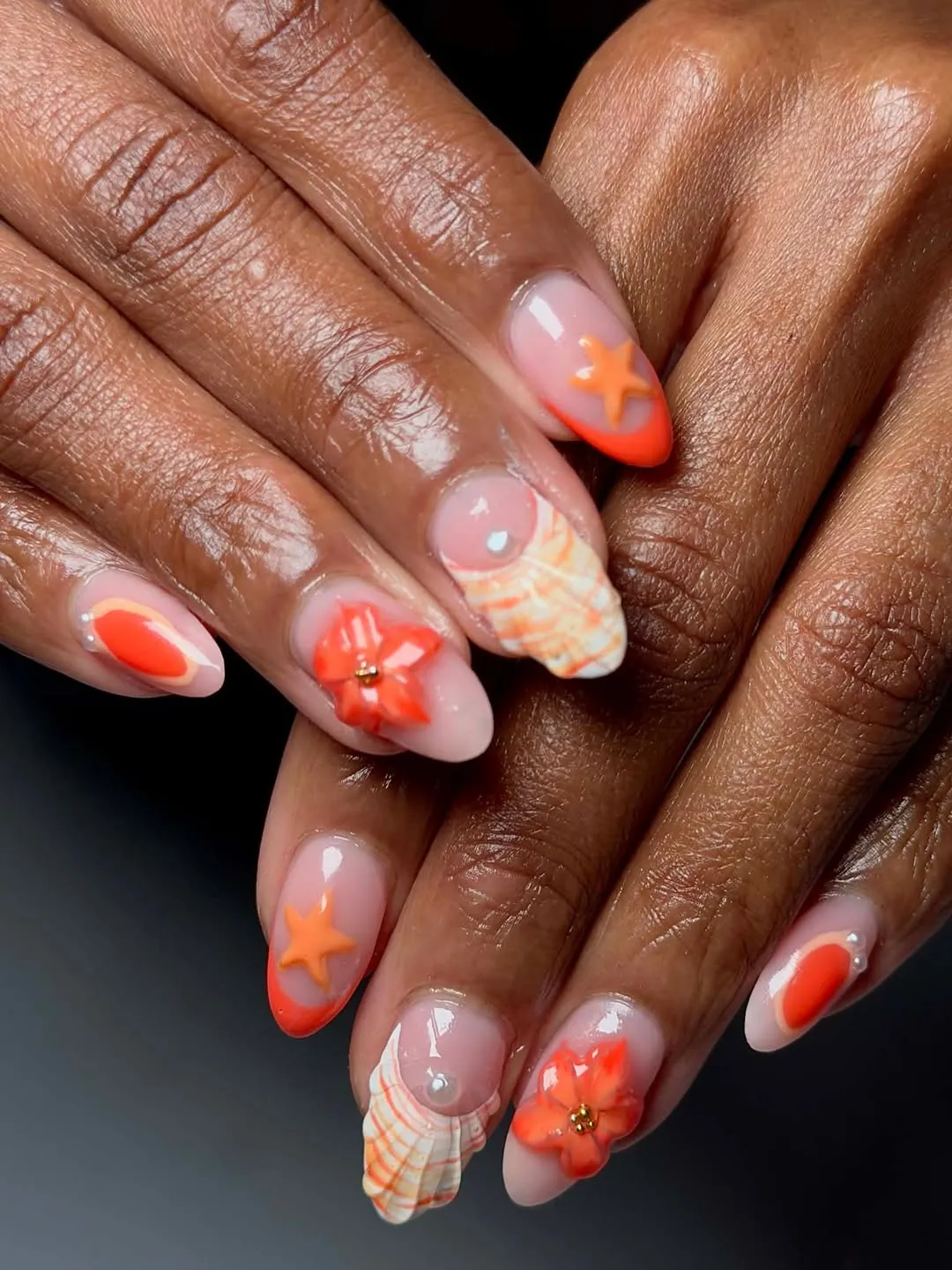 3D orange flowers with orange tips and striped accents