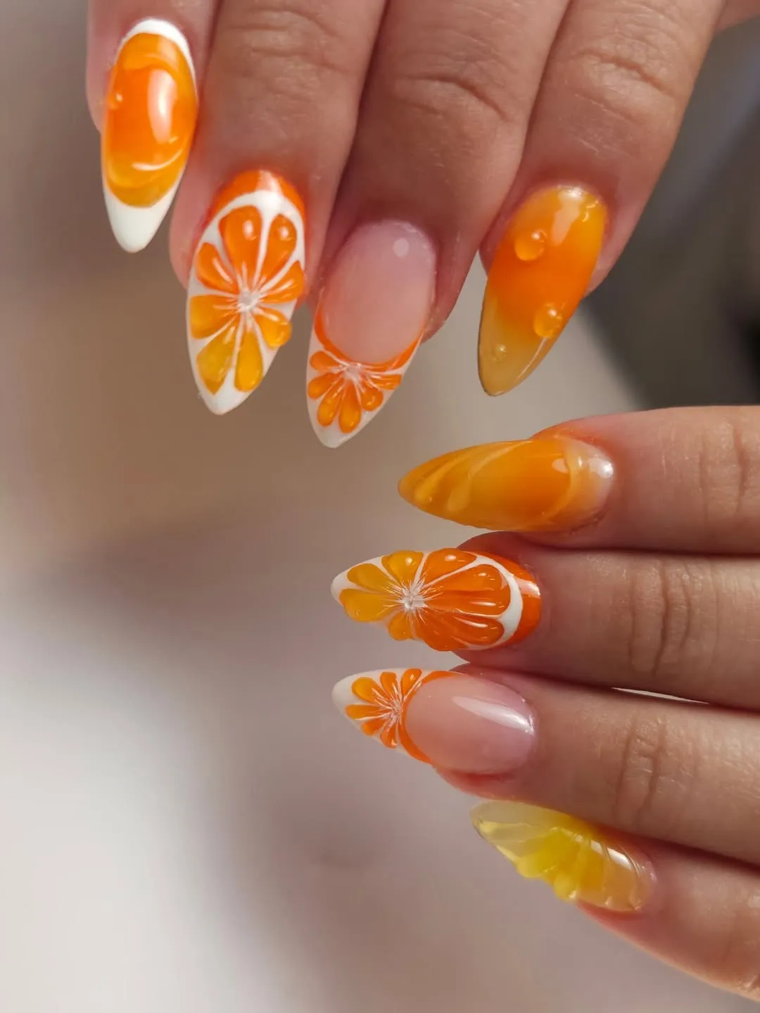 Citrus slice nails with glossy droplet accents