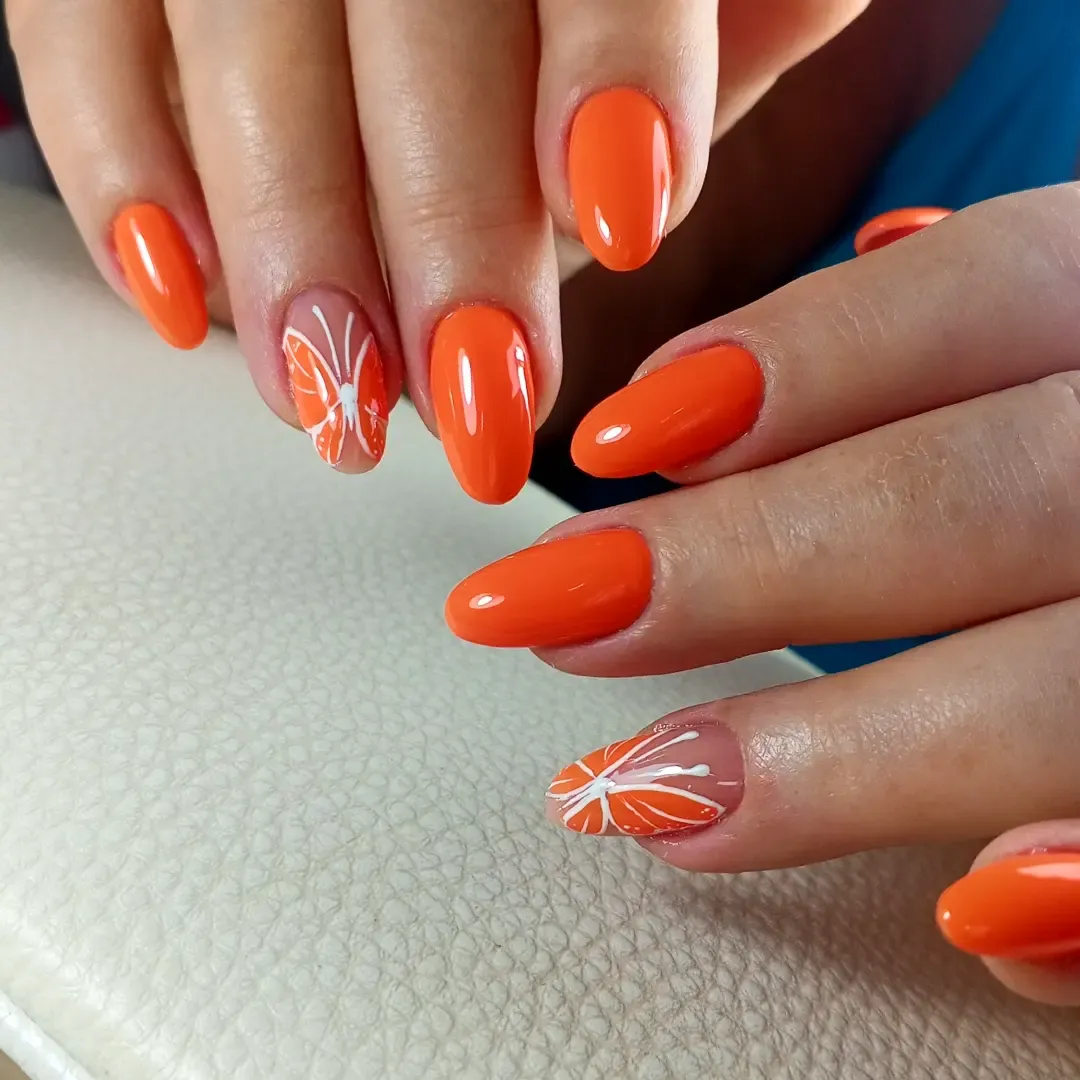 Solid orange with citrus slice accent nails