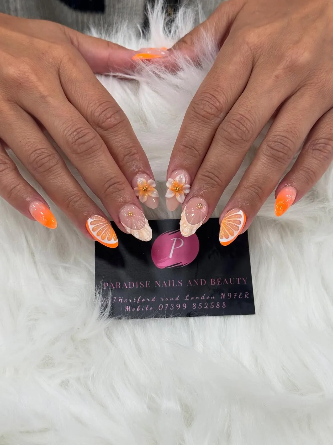 Orange gradients with citrus slices and 3D floral accents