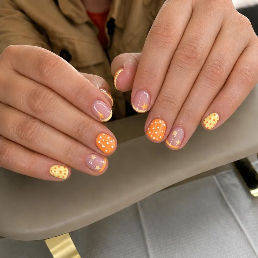Orange polka dots mixed with stars, tips, and line details