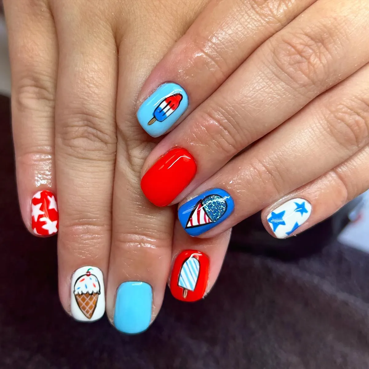 Light-blue icons with red, white, and blue accents