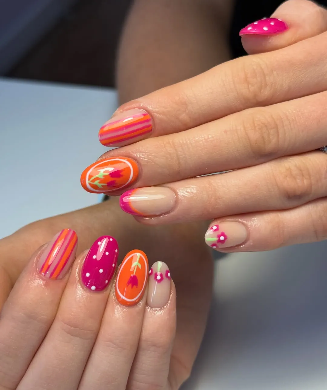 Mixed pink-orange set with stripes, dots, and floral motifs