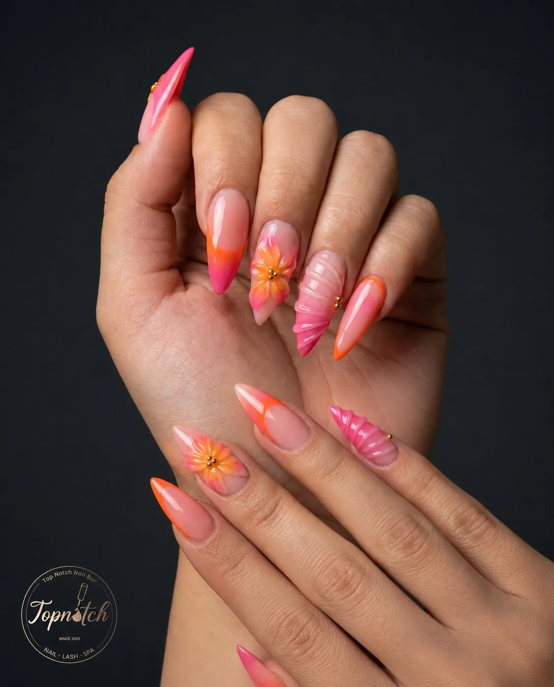 Stiletto ombrΓ© tips with 3D flowers and ribbed texture accents
