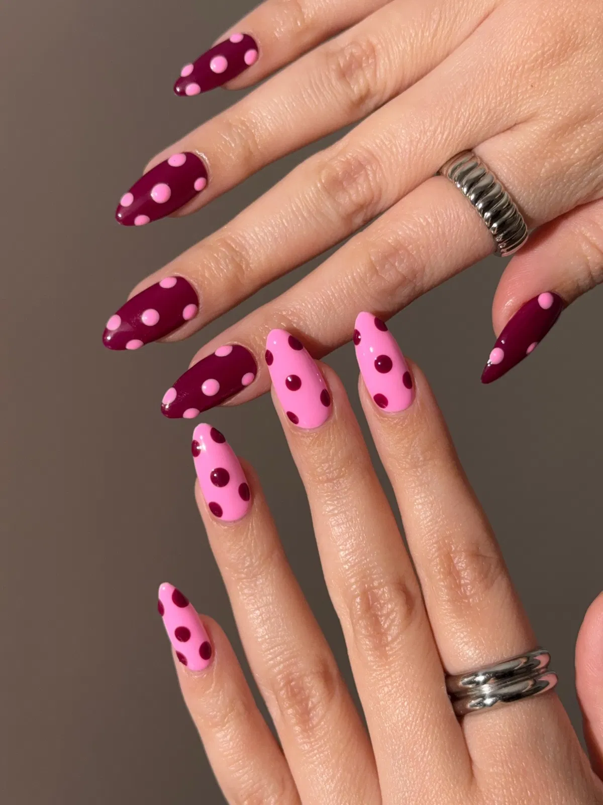 Two-tone burgundy and pink polka dots