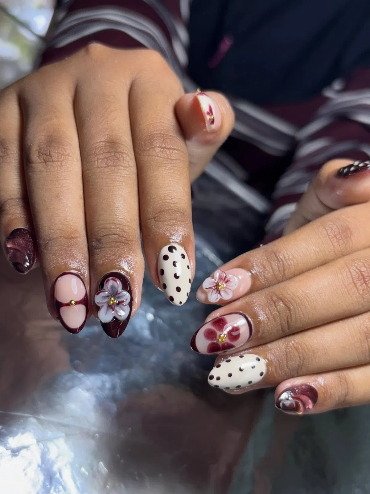 Burgundy florals with black polka-dot accents