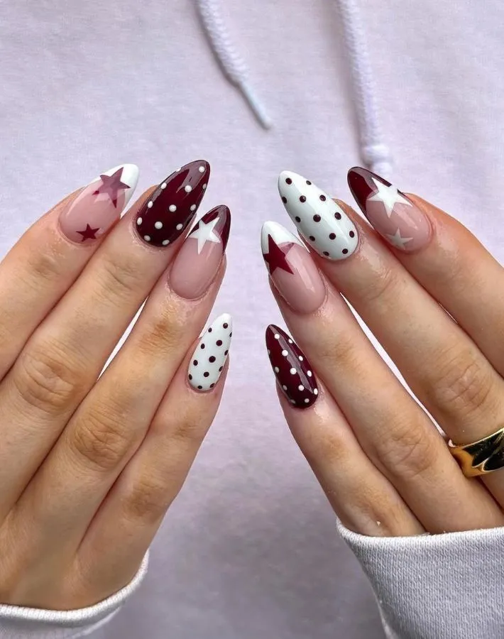 Burgundy-and-white polka dots with star French tips