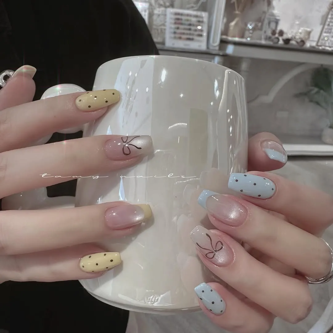 Pastel polka dots with bow line art accents