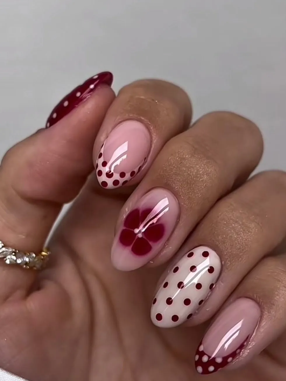 Burgundy polka dots with floral accent