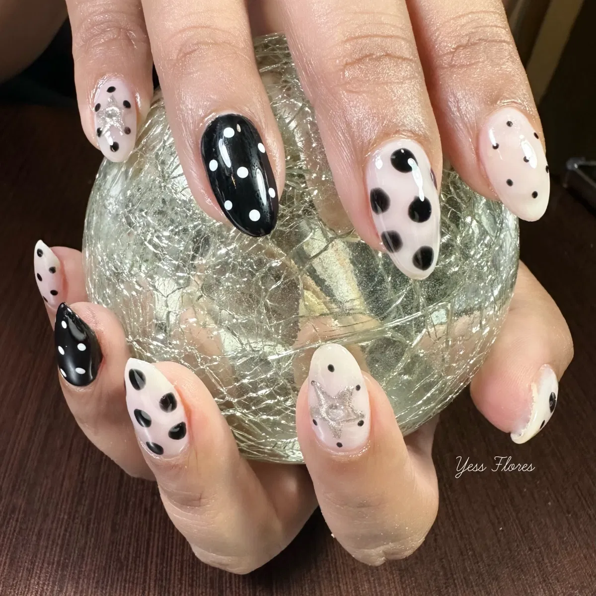 Mixed-size polka dots with a silver star accent