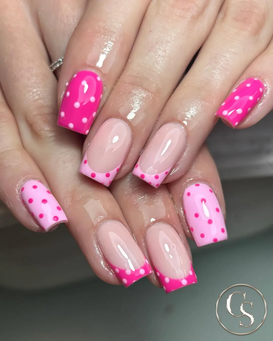 Pink-on-pink polka dots with mixed solid and tip designs