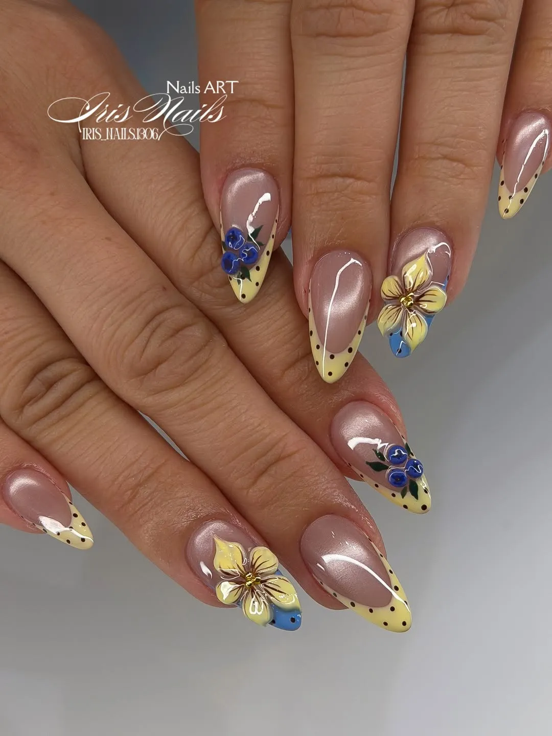 Dotted yellow tips with 3D floral accents