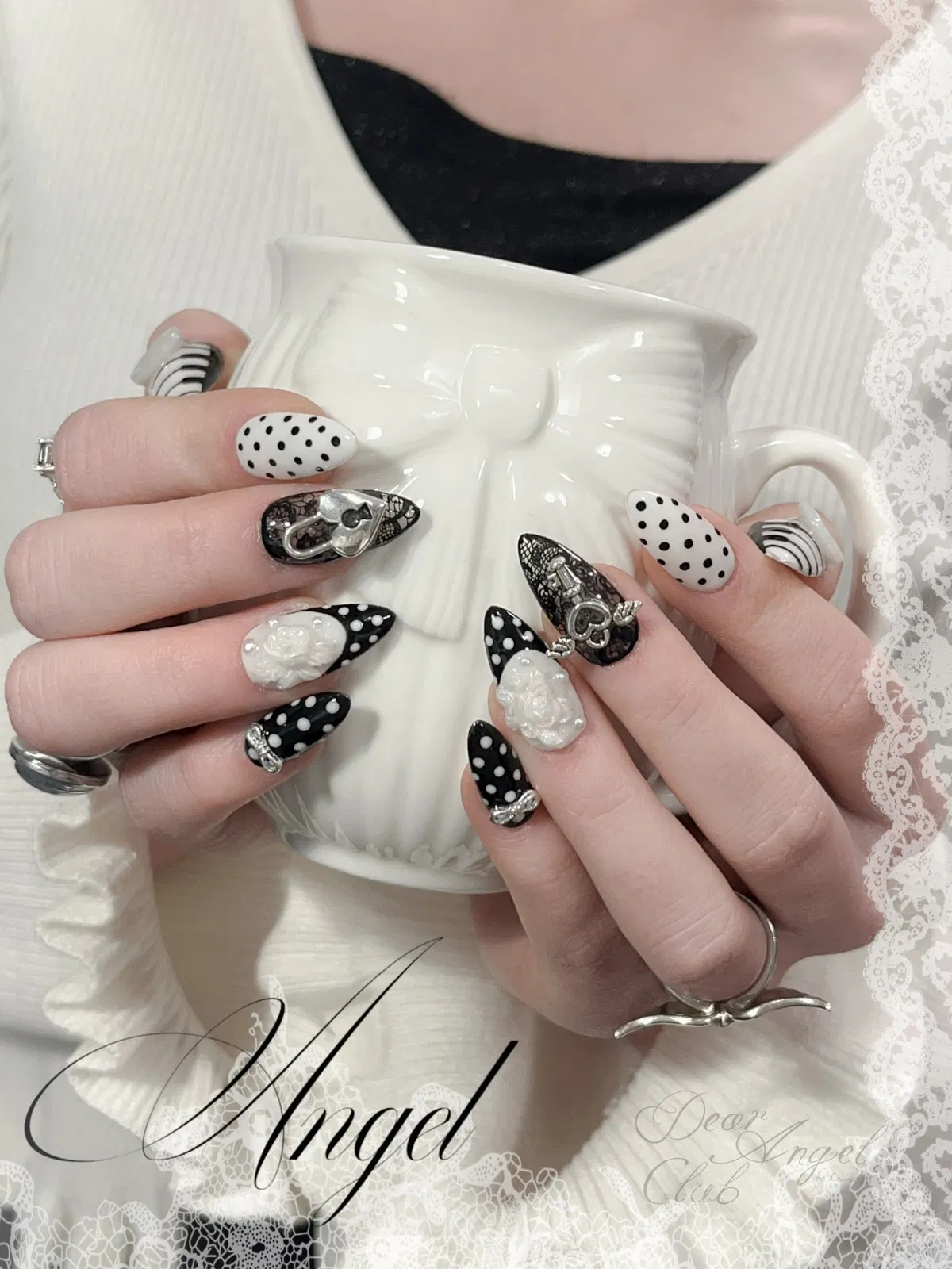 Black-and-white polka dots with lace patterns and 3D embellishments