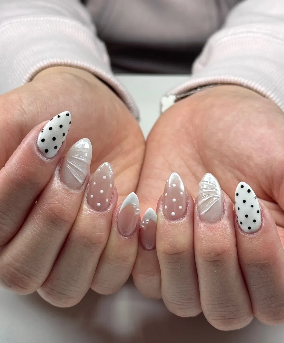 Neutral polka dots with raised white line accents