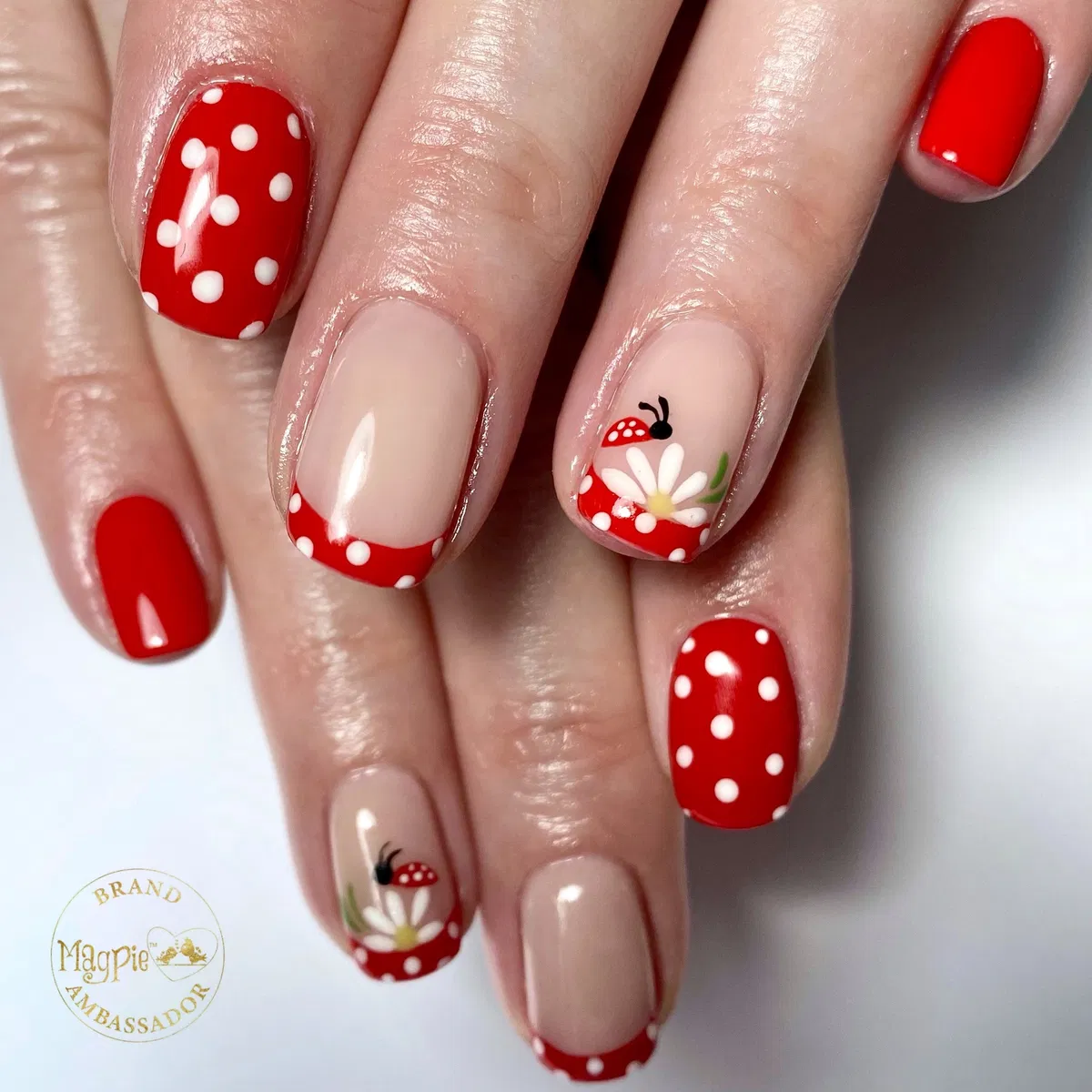 Red-and-white polka dots with floral ladybug accent