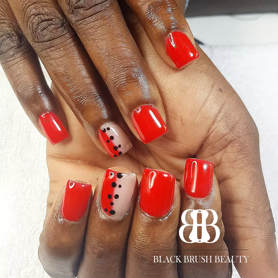 Bright red set with black-dot accent nails