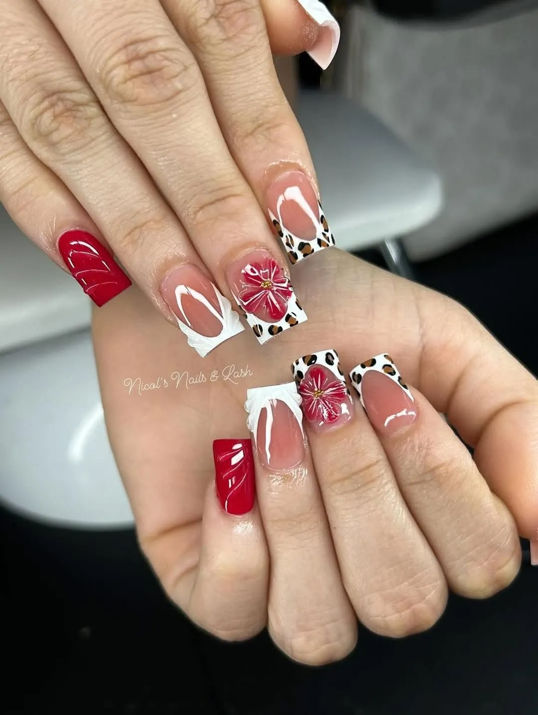 Red solids with leopard tips, floral accents, and bow detail
