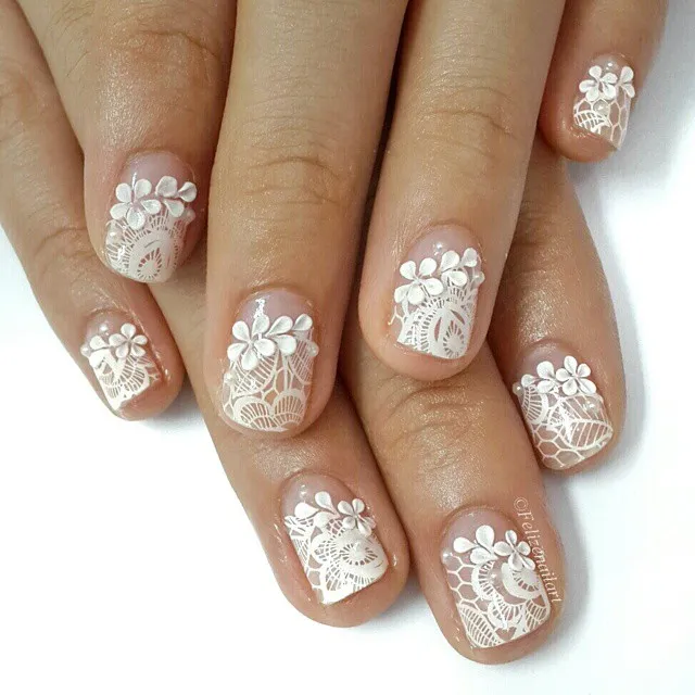 Nude short nails with white lace and raised florals