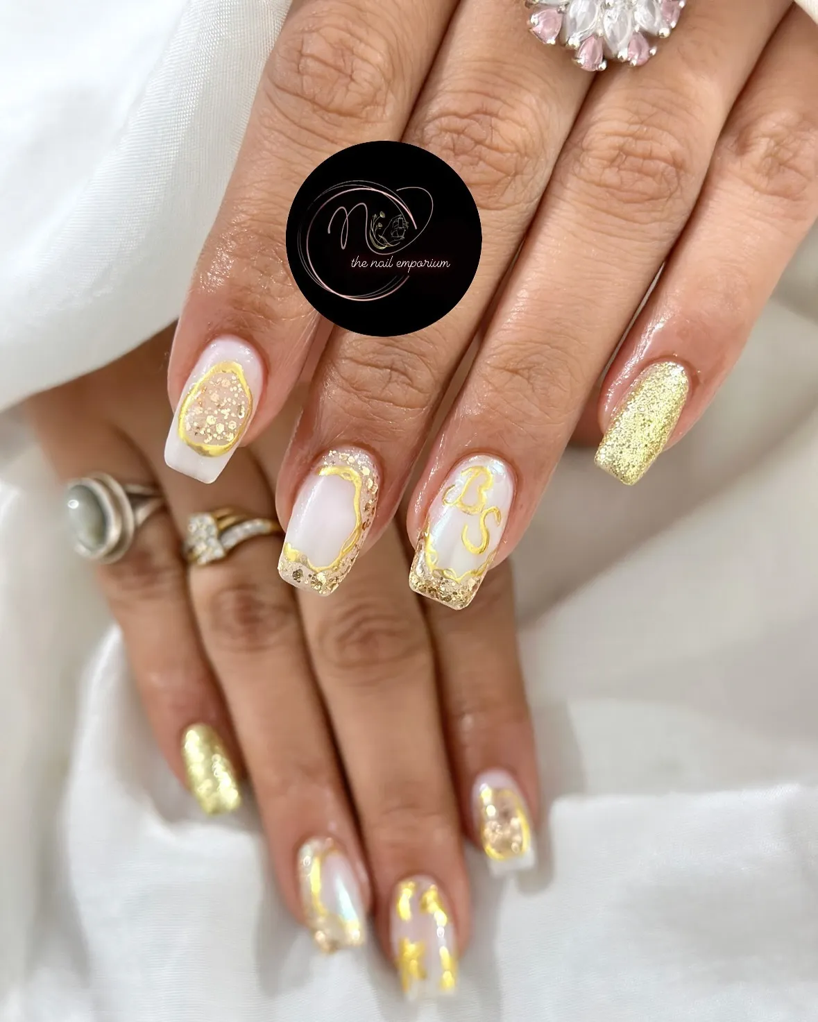 White-pink set with gold outlines and glitter tips