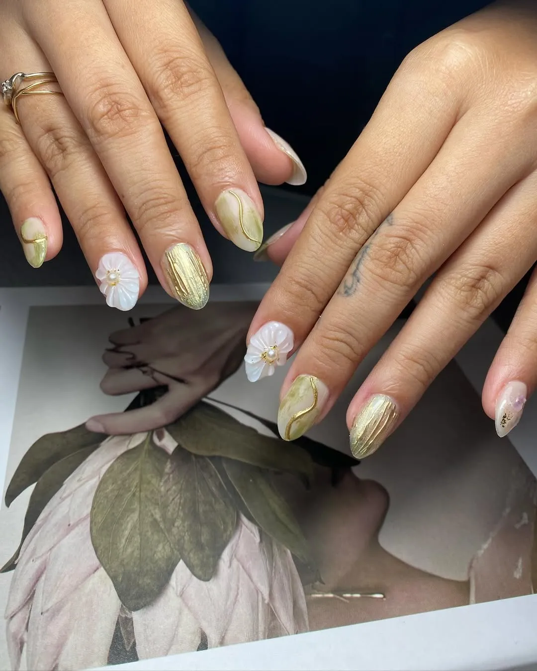 Gold and soft green accents with 3D white flowers