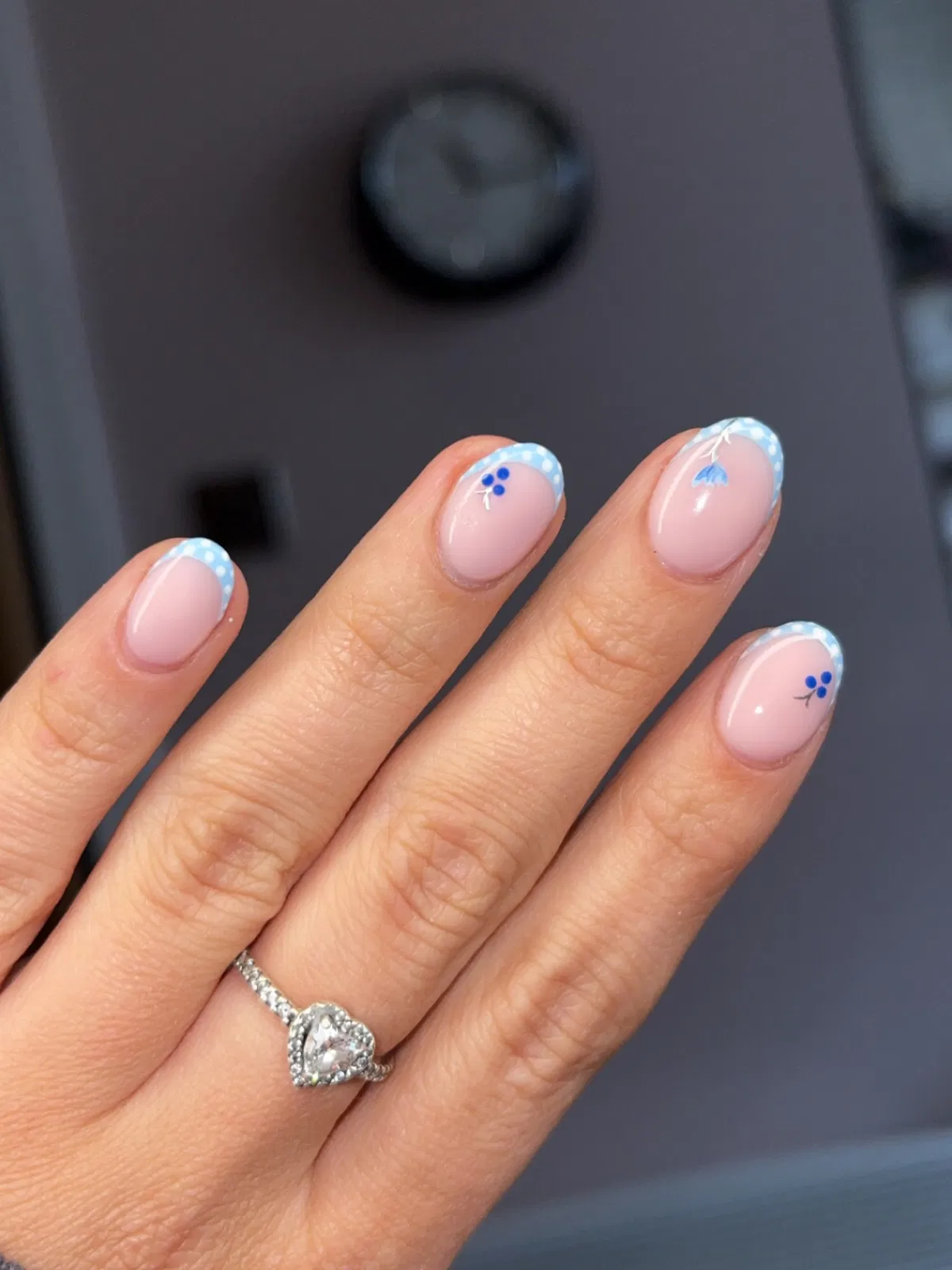 Blue dotted French tips with tiny floral accents