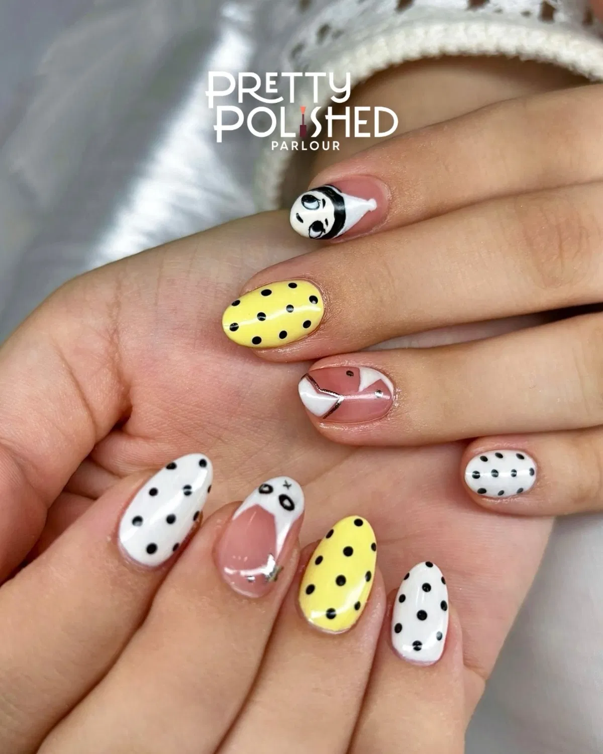 Yellow and white polka dots with graphic face and geometric accents