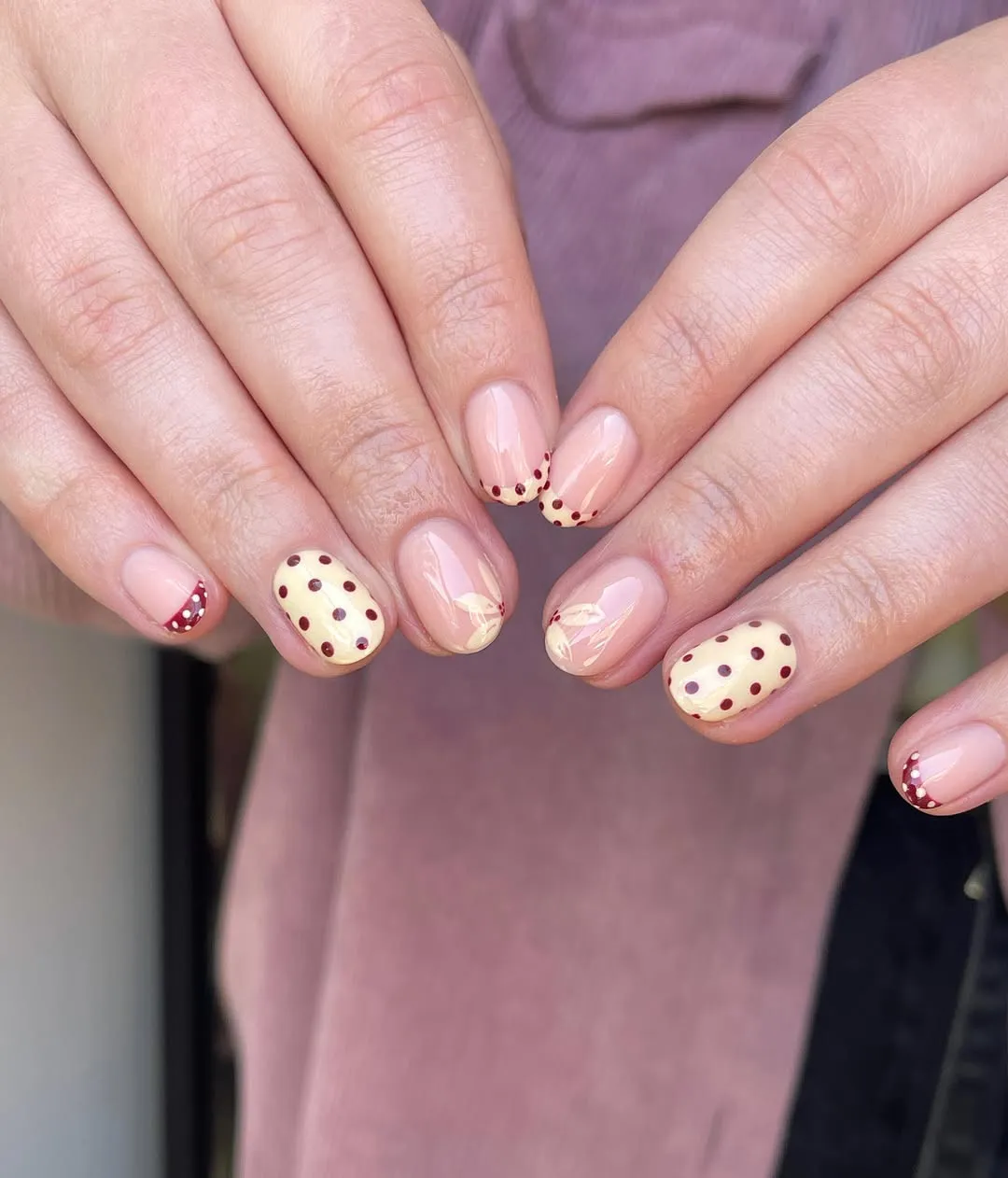 Neutral base with cream-and-brown polka dot accents