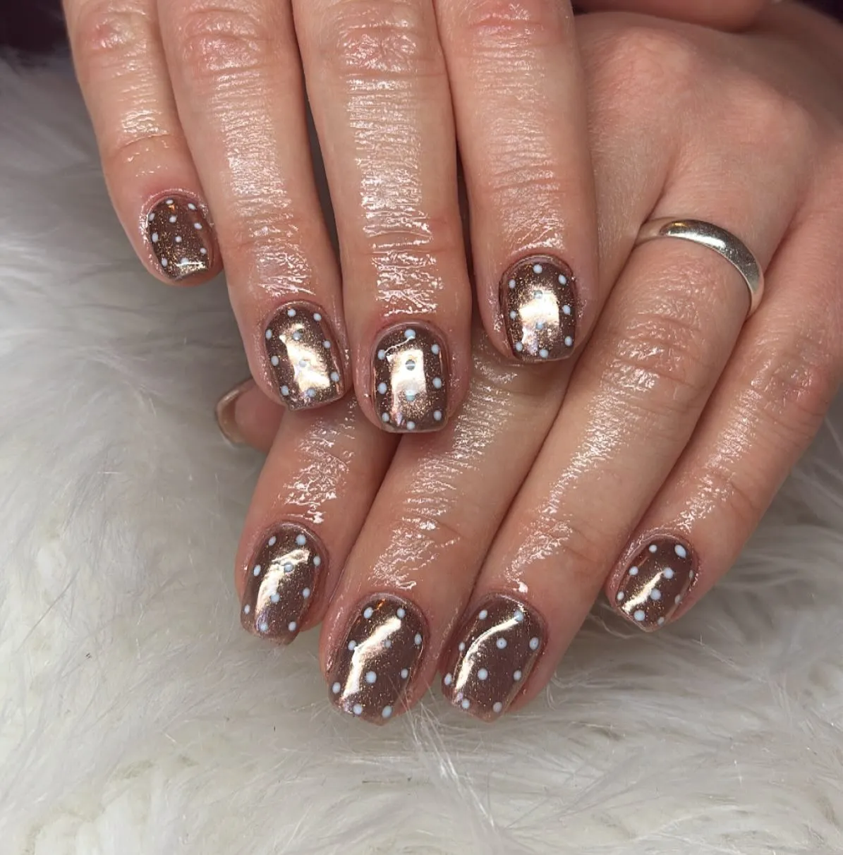 Brown sparkle base with light blue polka dots