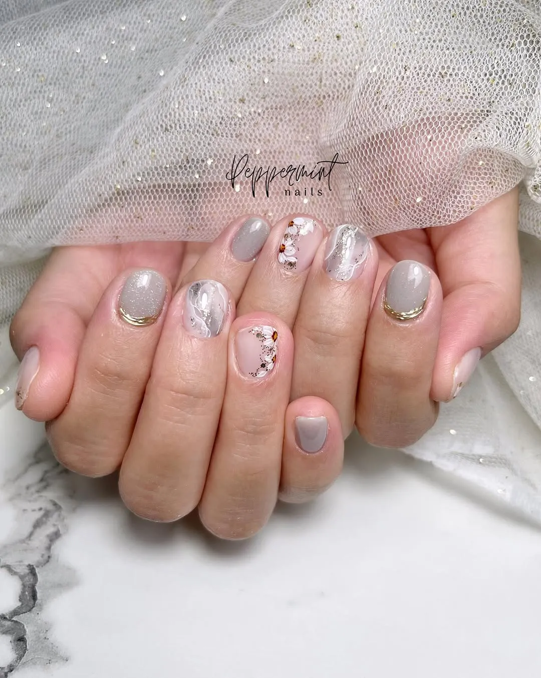 Greige and blush mix with gold arcs and marbled accents